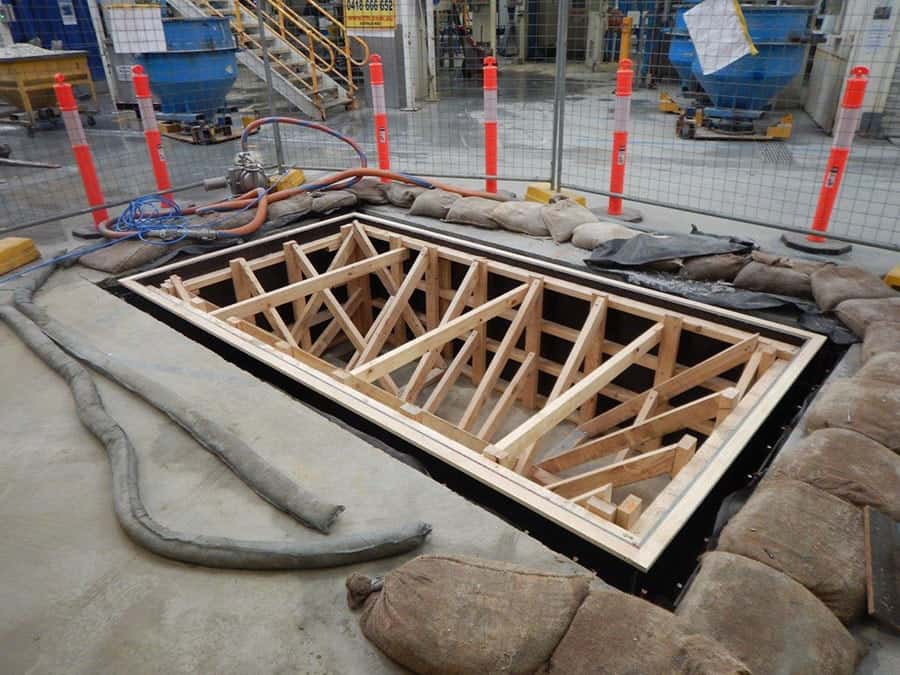 Timber formwork for an industrial concrete pit