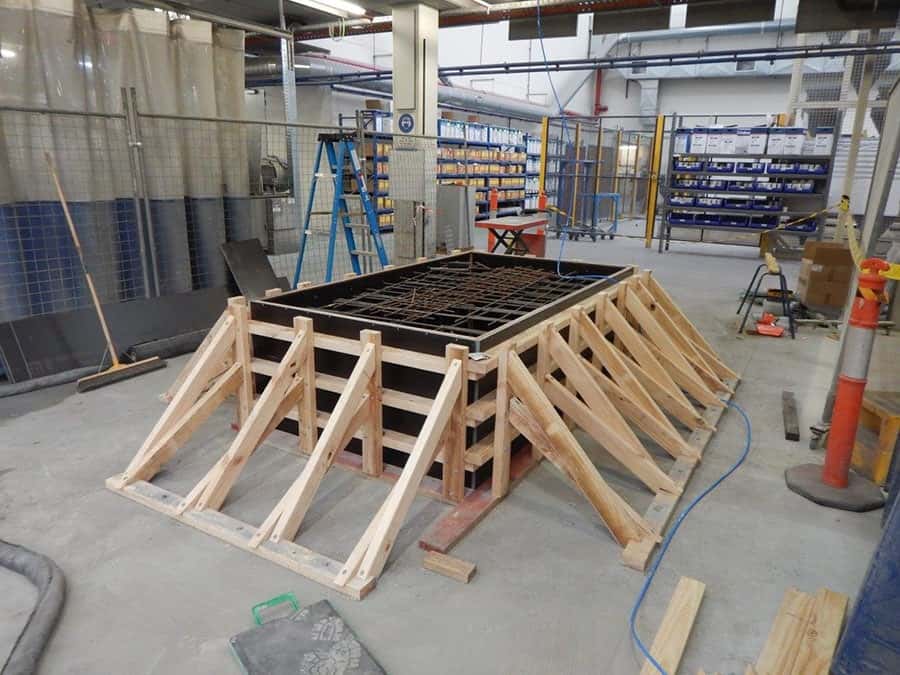 Timber bracing surrounding a concrete structure