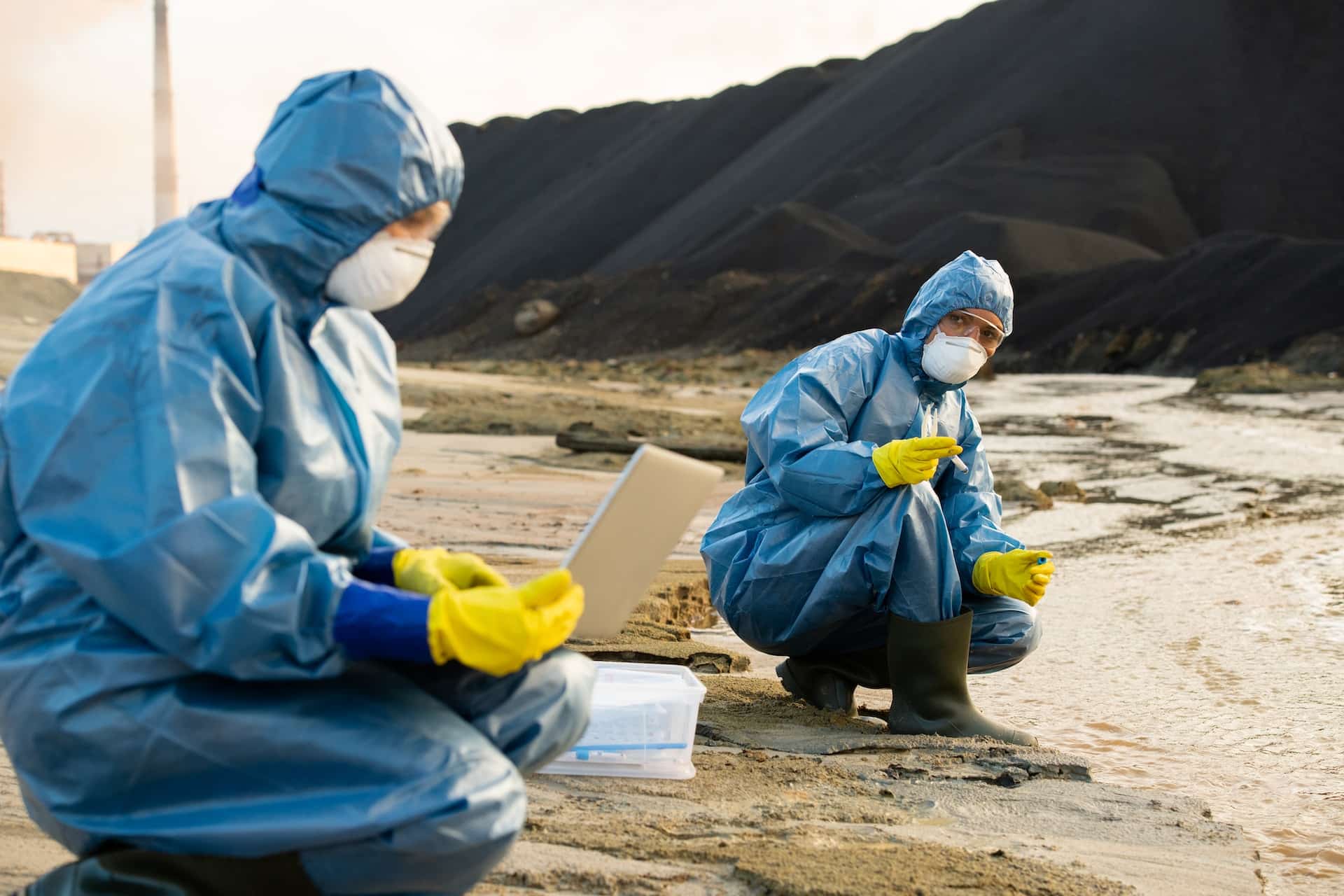 Environmental scientists testing water