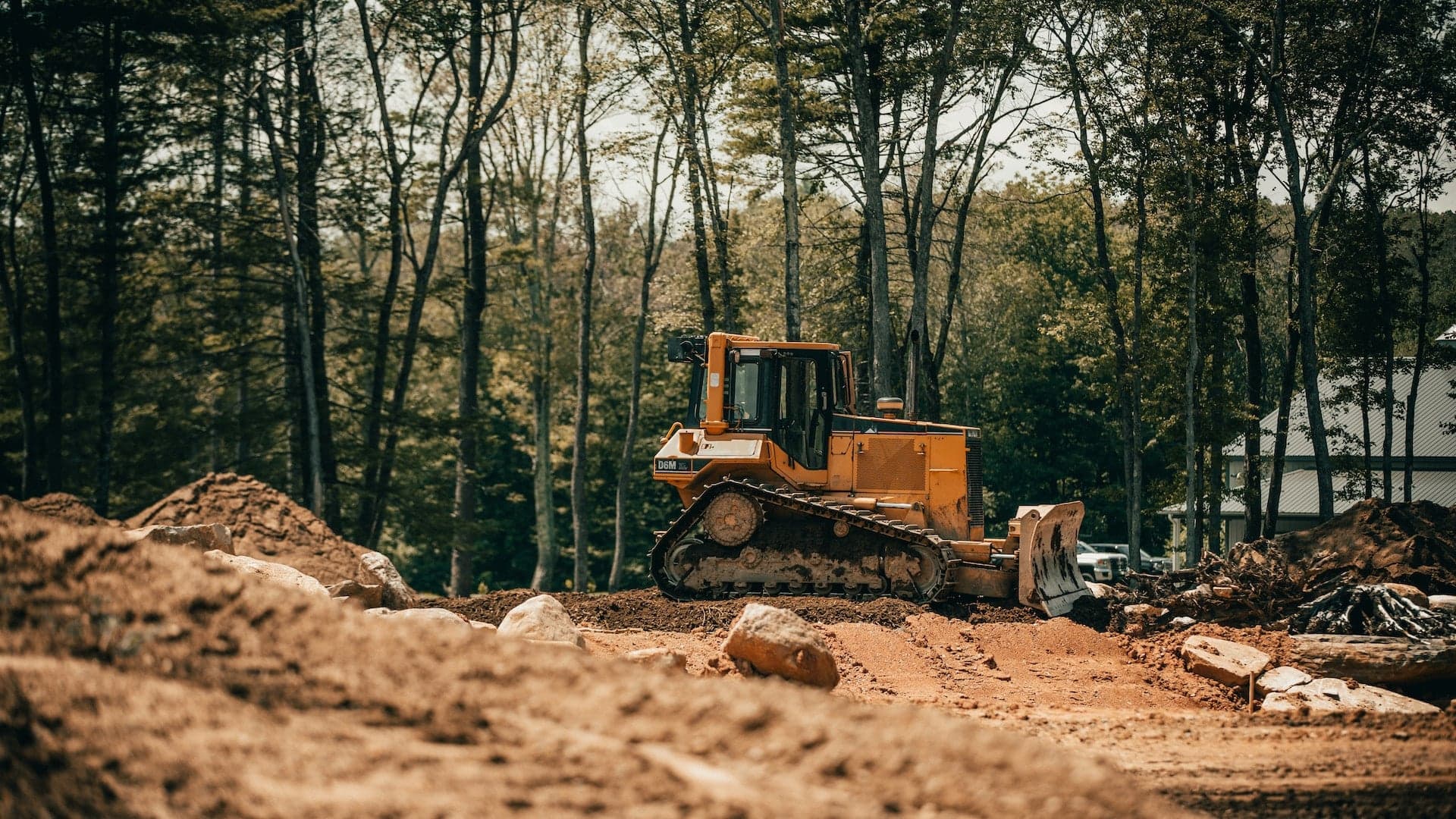 Yellow bulldozer at construction site