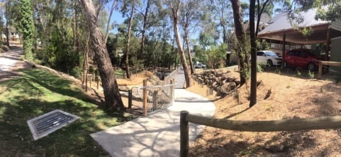 Rehabilitated waterway and rock-lined creek by Woods Environmental Services